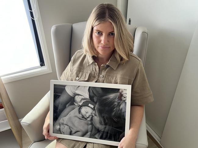 Rebecca Spreadborough with a picture of son Alby