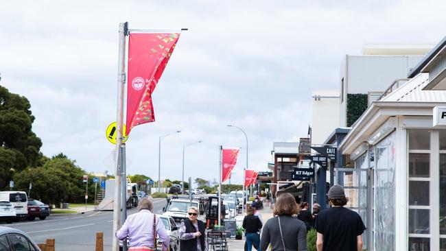 The Borough of Queenscliffe installed new Christmas flag decorations in Queenscliff and Point Lonsdale this week to bring “a bit of seasonal cheer to the streets”. Picture: supplied.