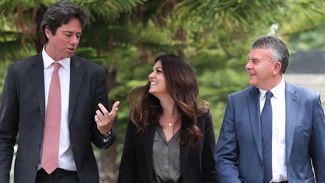 AFL boss Gillon McLachlan with the league’s head of mental health and wellbeing Dr Kate Hall and Lifeline Australia boss Colin Seery.