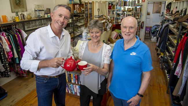 Hope’s Simon Mackey and Ross Gordon with manager Marian Hartland at the recently reopened op shop on Whitehorse Rd. Picture: Andy Brownbill