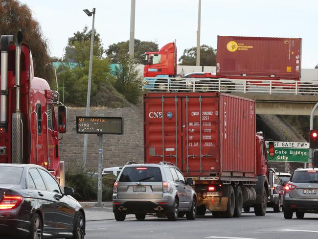 Trucks line up to get onto the Westgate Freeway. Picture: David Crosling