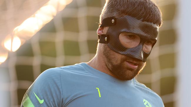 DOHA, QATAR - JANUARY 10: Australian goalkeeper Mat Ryan  looks on during an Australia Socceroos training session ahead of the the AFC Asian Cup at Qatar University Field 11 on January 10, 2024 in Doha, Qatar. (Photo by Robert Cianflone/Getty Images)