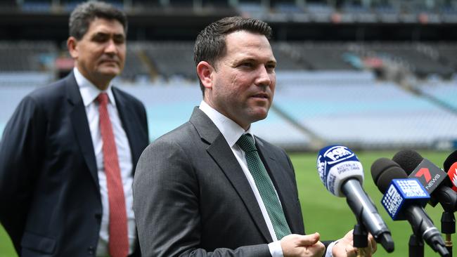 NSW Acting Minister for Sport Geoff Lee (left) and FFA CEO James Johnson speaks to the media during the Football for Fires Fundraiser launch in Sydney, Tuesday, January 28, 2020. (AAP Image/Joel Carrett) NO ARCHIVING