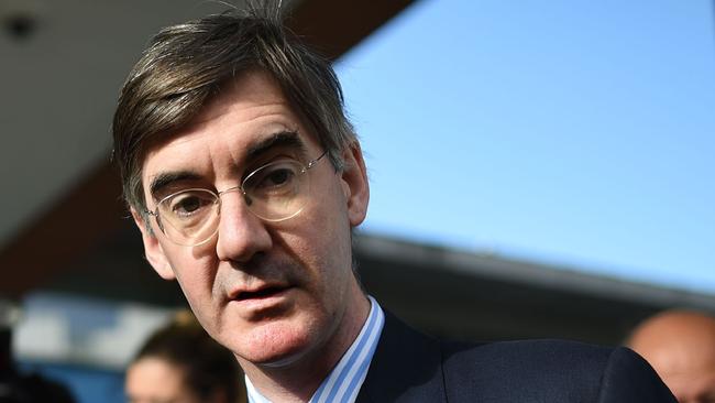 British Conservative politician Jacob Rees-Mogg arrives at the Manchester Central Convention Centre in Manchester on October 3, 2017, the third day of the Conservative Party annual conference. / AFP PHOTO / Oli SCARFF