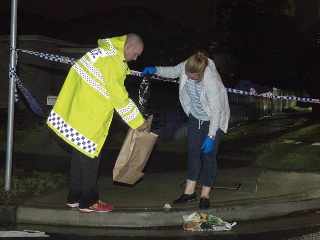 Police bag evidence while investigating a shooting in Auburn. Photos: Chris McKeen