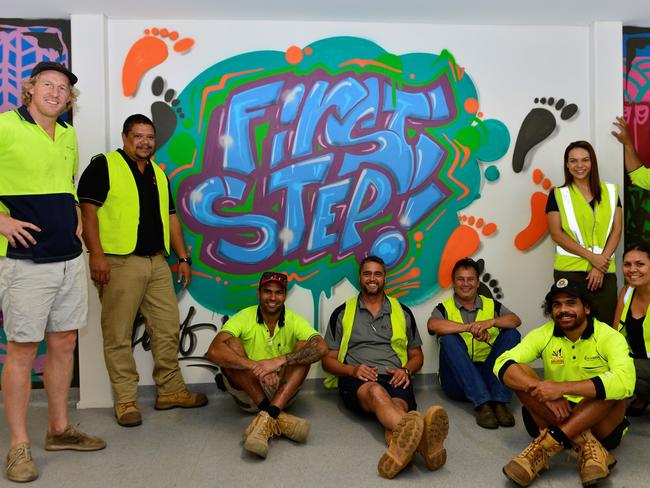 Chris Tedcastle of First Step Enterprises (second left) with members of his team. Picture: Supplied
