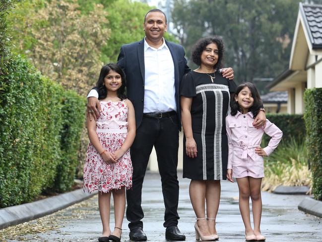 16/01/2020. Mukesh Kumar with his wife Shilpi and daughters Misha 9 and Prisha 6, photographed at home in Toongabbie in Sydneys' West. The Kumar family, originally from India are all becoming citizens this Australia Day. Britta Campion / The Australian