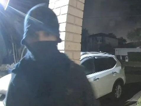 A masked prowler has attacked a series of women in a terrifying spree across Sydney's west - and police have warned that he will strike again. The man was caught on camera at about 4am on Wednesday as he robbed a number of properties in Northmead, north of Parramatta. An hour later, the same man carjacked a Mitsubishi Outlander SUV as its owner bought fuel at the servo on Windsor Road at North Rocks. Picture: 7NEWS