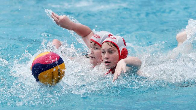 Gosford under-14 players Jack Dukta and Angus Newport in action against Wyong at Gosford Pool on on Saturday. Picture: Sue Graham