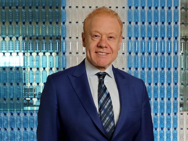 28/11/2018: Anthony Pratt in front of a wall of plastic bottles at the Visy office in Melbourne. Stuart McEvoy/The Australian.