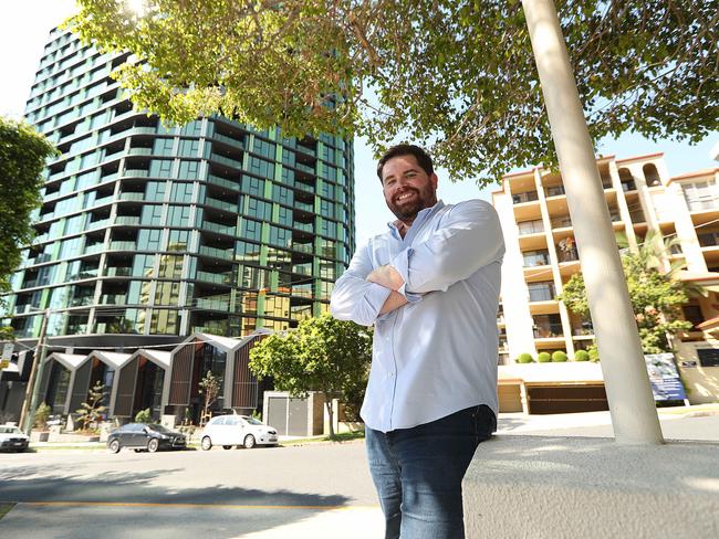 24/10/2019: Kurt Allison is purchasing an investment property in the new Lotus apartment tower (behind him) , at Kangaroo Point, Brisbane.  Research from Place Advisory which shows Brisbane's rate of growth and market depth will make it a good opportunity for investors.  Lyndon Mechielsen/The Australian