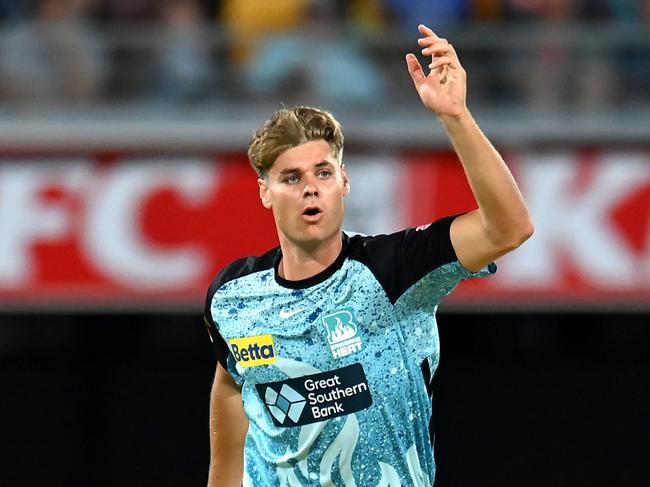 BRISBANE, AUSTRALIA - DECEMBER 07: Spencer Johnson of the Heat reacts during the BBL match between Brisbane Heat and Melbourne Stars at The Gabba, on December 07, 2023, in Brisbane, Australia. (Photo by Albert Perez/Getty Images)