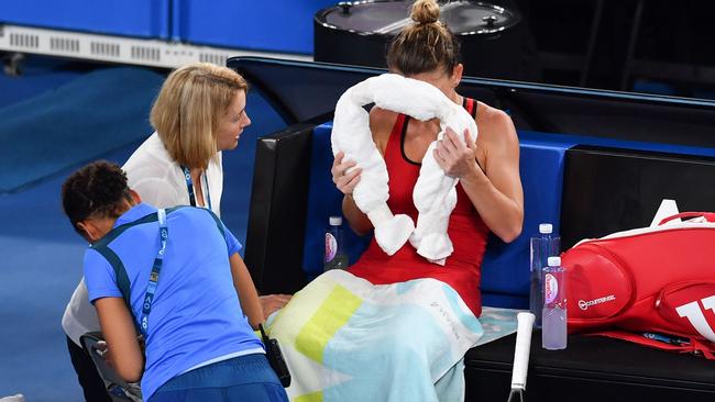 Simona Halep said she had a headache and was dizzy during the second set.