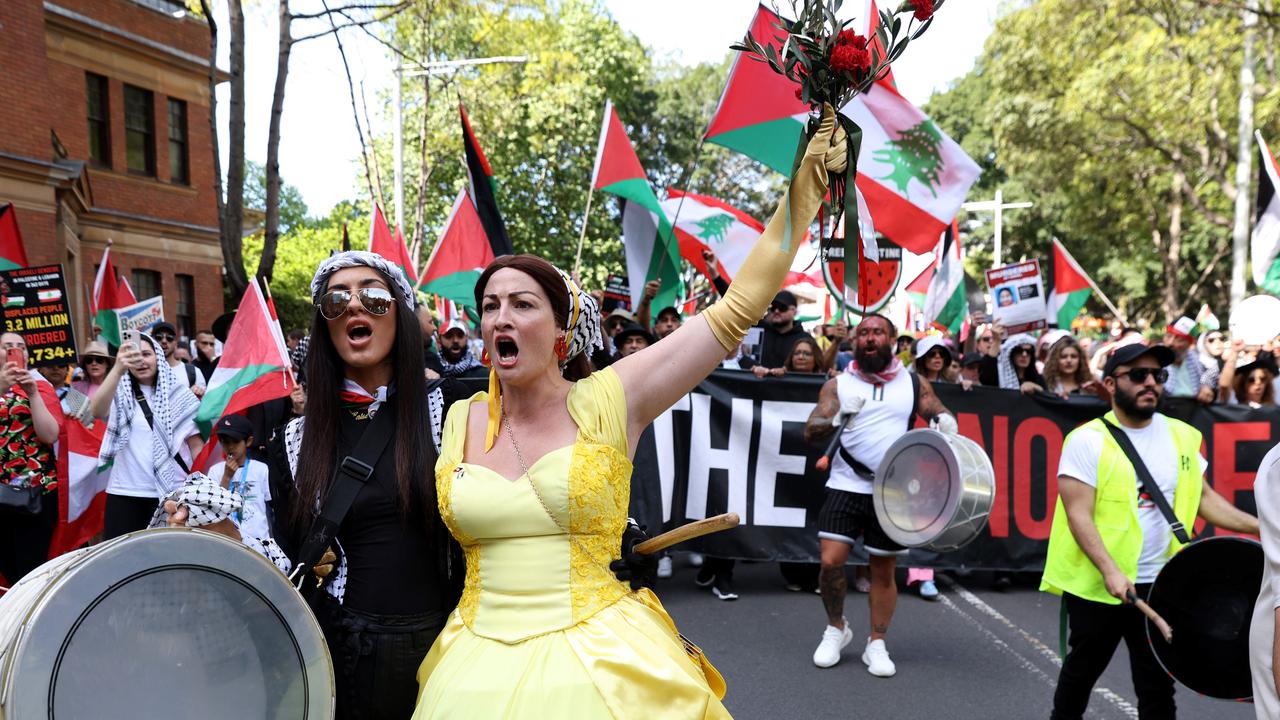 ‘Complicit’: Albo lashed as thousands protest