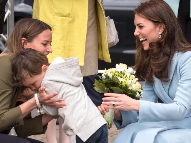 Kate Middleton: Little boy presents royal with flowers, then hides ...