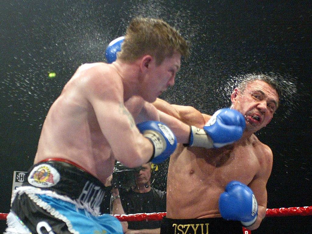 JUNE 5, 2005: Boxer Ricky Hatton of England (L) battles it out with Kostya Tszyu of Australia during their boxing match in Manchester, 05/06/05. Hatton took the title from champion Tszyu on the 11th round. A/CT