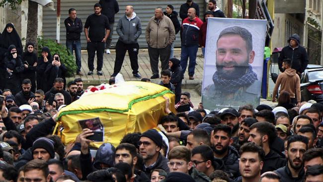 Mourners for a claimed Hezbollah fighter, Australian Ali Bazzi, reportedly killed in an Israeli bombardment the previous night, during a funeral procession this week in Bint Jbeil, in southern Lebanon. Picture: AFP