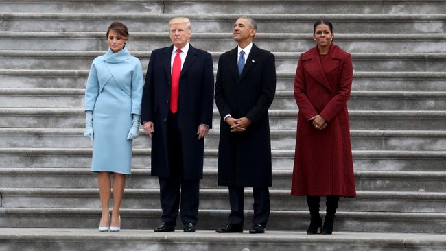 Donald Trump and Barack Obama stand on the steps of the US Capitol with First Lady Melania Trump and Michelle Obama on Inauguration Day. Picture: Getty Images