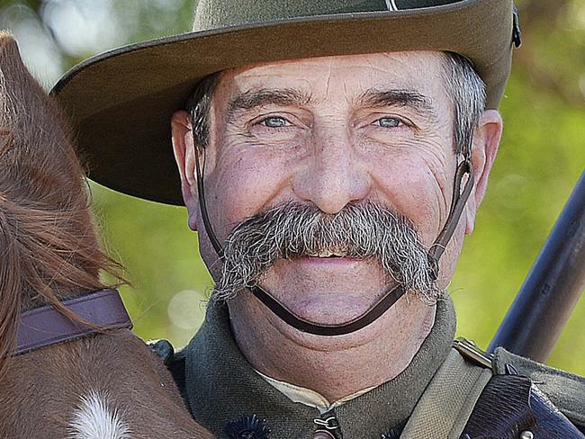 Bill & Sharon Gunter with 'George' at their Callington farm, dressed as an Australian Amy Nurse and Light Horseman from World War One. The couple will take part in the Anzac Day parade. picture: Bianca De Marchi