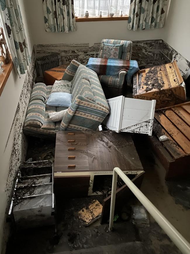 Margaret and Philip Powe (Powe) of Berriedale had flood water inundate their entire home during the recent heavy rain in Hobart and have lost everything that was in the house. Picture: Janette Good