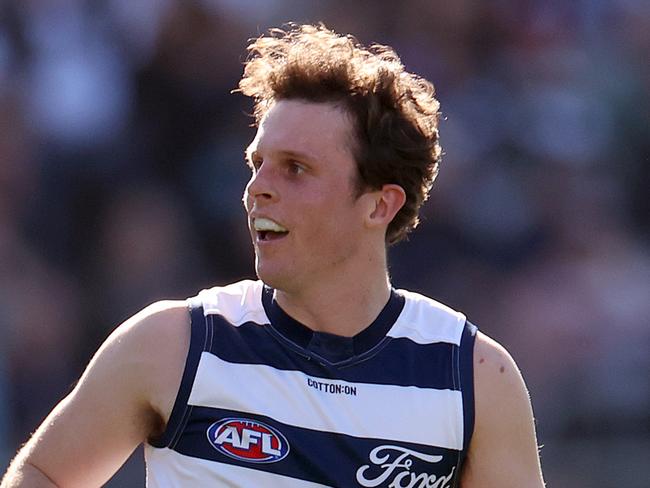 GEELONG, AUSTRALIA - AUGUST 24: Max Holmes of the Cats reacts during the round 24 AFL match between Geelong Cats and West Coast Eagles at GMHBA Stadium, on August 24, 2024, in Geelong, Australia. (Photo by Kelly Defina/Getty Images)