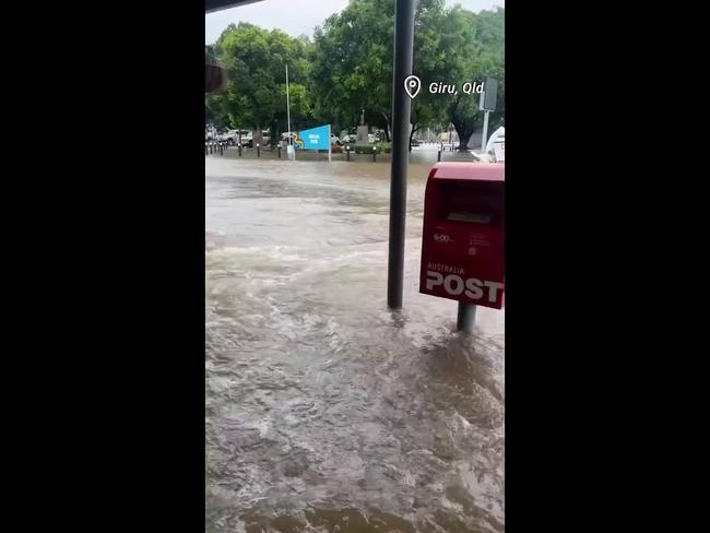 Floodwaters rush through Giru, south of Townsville