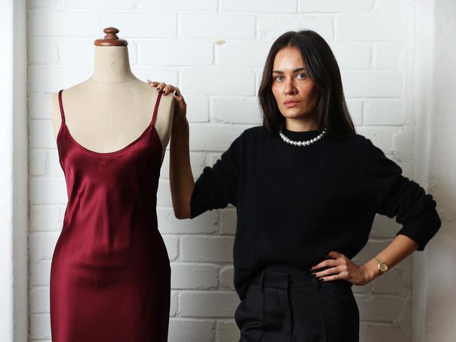 7/5/23: Beare Park designer Gabriella Pereira with one of her designs ahead of Australian Fashion Week. John Feder/The Australian.