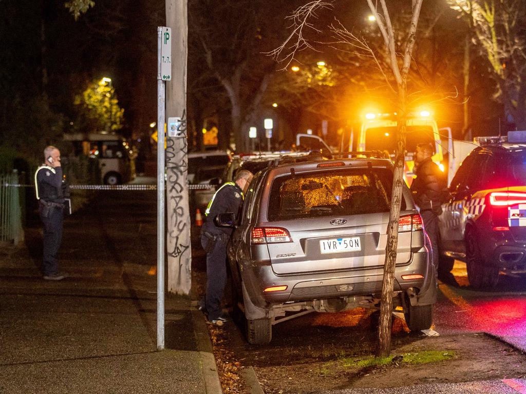 Police attend the scene of a fatal shooting in Napier St, Fitzroy. Picture: Jake Nowakowski