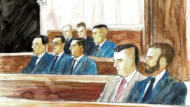 A court sketch of the eight men while on trial in the Supreme Court. Picture: Timothy Ide