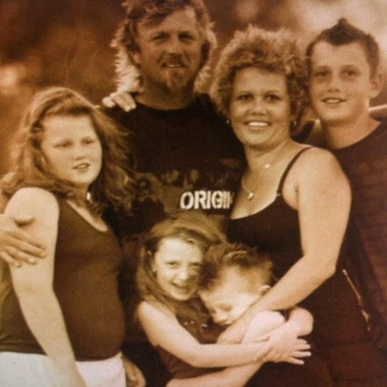 J'maine Hopgood (front) with his late father Dale, mother Anita and siblings.