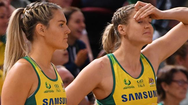 A dejected (lt-rt) Ash Brazill, Gretel Tippett and Caitlin Bassett of Australia after their loss to New Zealand during the Constellation Cup International Test match between the Australia Diamonds and the New Zealand Silver Ferns at  Qudos Bank Arena in Sydney, Sunday, October 20, 2019. (AAP Image/Dean Lewins) NO ARCHIVING, EDITORIAL USE ONLY