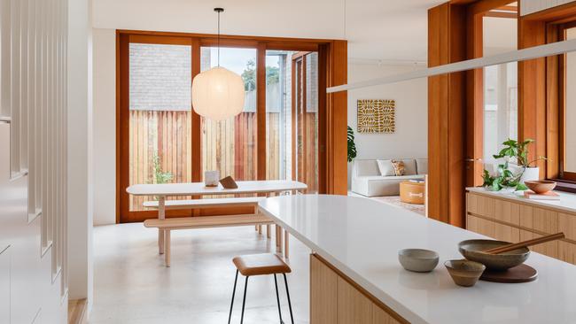 Timber and whites abound in the semi-detached homes, reflecting light and creating warmth.