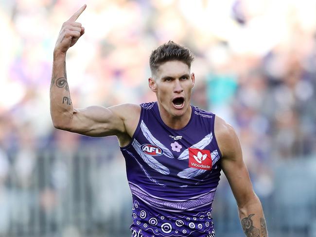 PERTH, AUSTRALIA - JULY 03: Rory Lobb of the Dockers celebrates after scoring a goal during the 2022 AFL Round 16 match between the Fremantle Dockers and the Port Adelaide Power at Optus Stadium on July 03, 2022 in Perth, Australia. (Photo by Will Russell/AFL Photos via Getty Images)