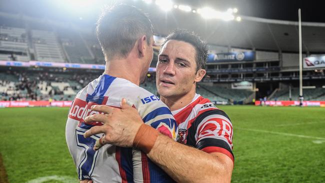 What could’ve been... Mitchell Pearce (L) could’ve hung around to learn from Cronk. Picture: AAP