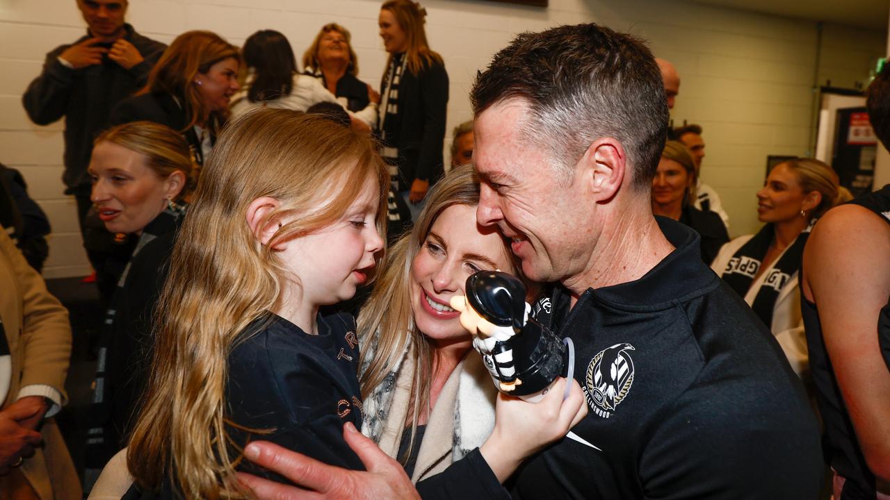 Craig McRae with wife Gabrielle and daughter Charlie. Picture: GWS