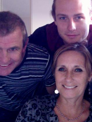 A family selfie of Phil Walsh, his wife Meredith and son Cy.