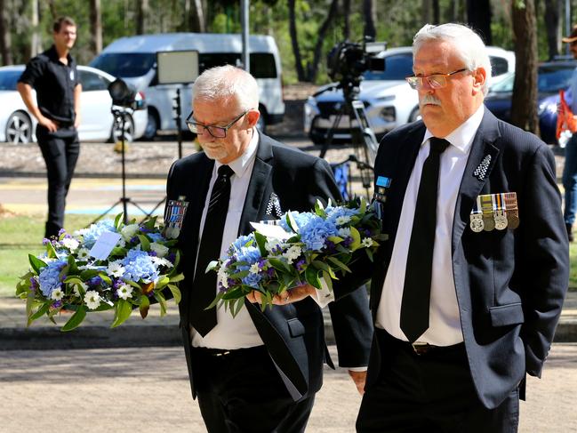 Mourners at the memorial service with full police honours for constables Rachel McCrow and Matthew Arnold at Brisbane Entertainment Centre. Picture: David Clark