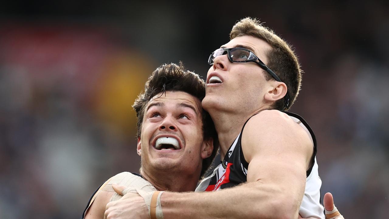 Mason Cox of the Magpies and Jack Silvagni of the Blues. Picture: Michael Klein