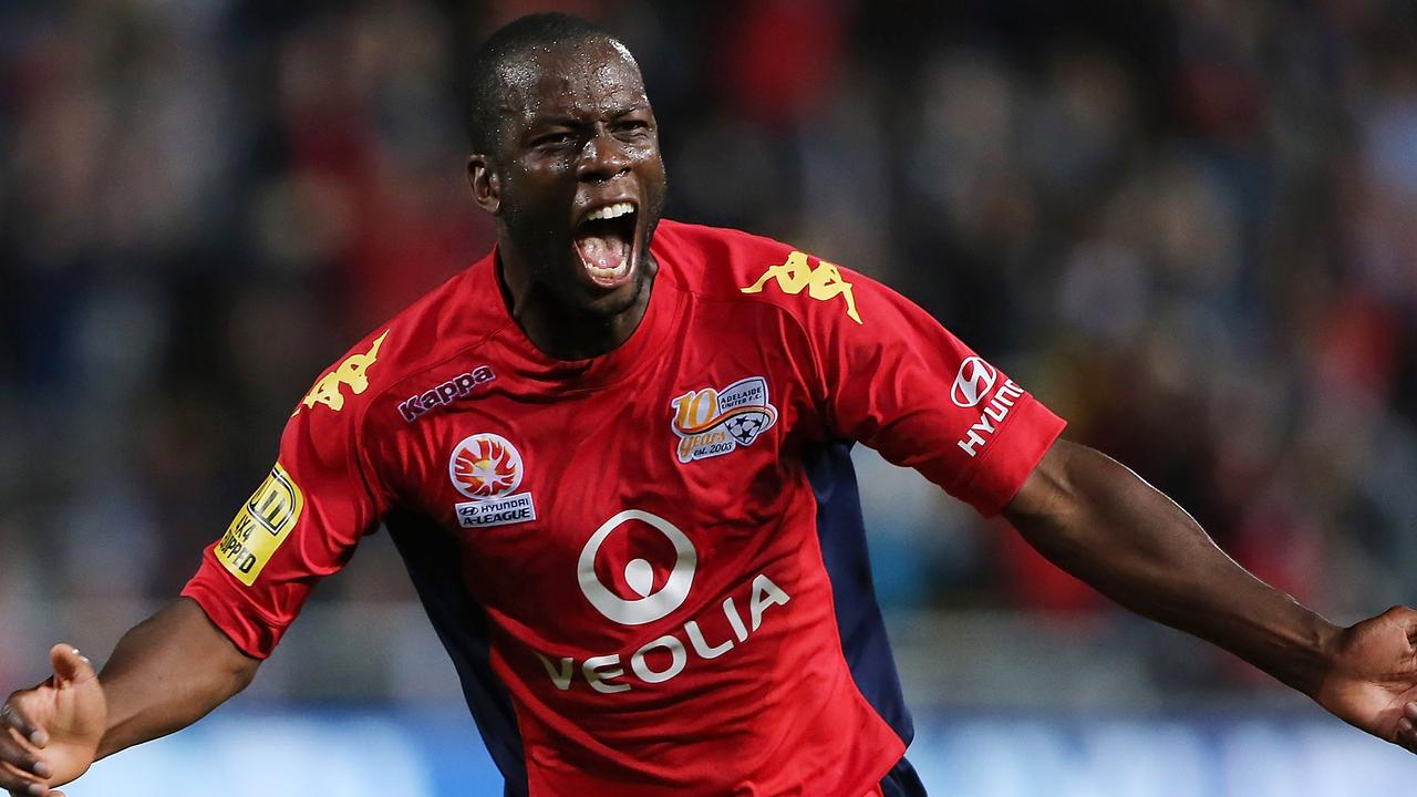 Bruce Djite celebrates a goal for Adelaide