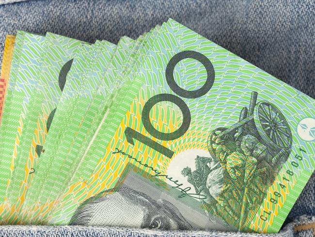 Australian 100 dollar notes in jeans pocket. money, wealthy, rich generic