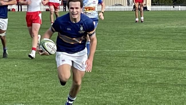 Churchie's Archie Wilson on his way to scoring.