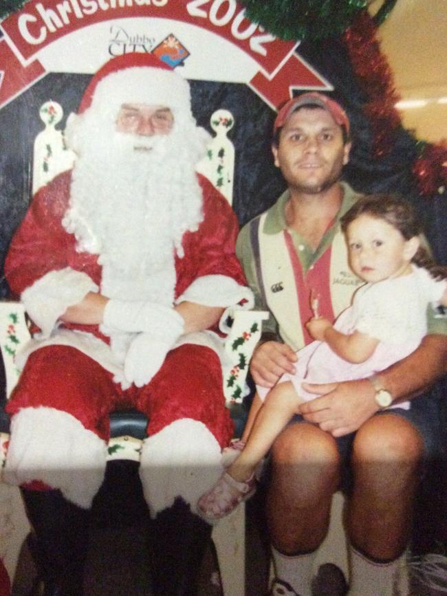 Wellington murder victim with one of his grandchildren.