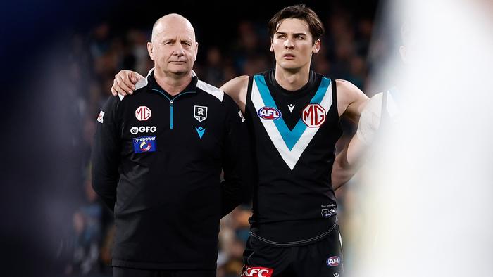 ADELAIDE, AUSTRALIA - SEPTEMBER 05: Ken Hinkley, Senior Coach of the Power and Connor Rozee of the Power pause for the national anthem during the 2024 AFL Second Qualifying Final match between the Port Adelaide Power and the Geelong Cats at Adelaide Oval on September 05, 2024 in Adelaide, Australia. (Photo by Michael Willson/AFL Photos via Getty Images)