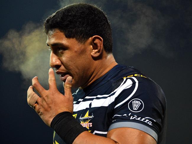 Cowboys Jason Taumalolo breath condensates as he comes off the field during the Round 18 NRL match between the Canberra Raiders and the North Queensland Cowboys at GIO Stadium in Canberra, Saturday, July 14, 2018. (AAP Image/Mick Tsikas) NO ARCHIVING, EDITORIAL USE ONLY