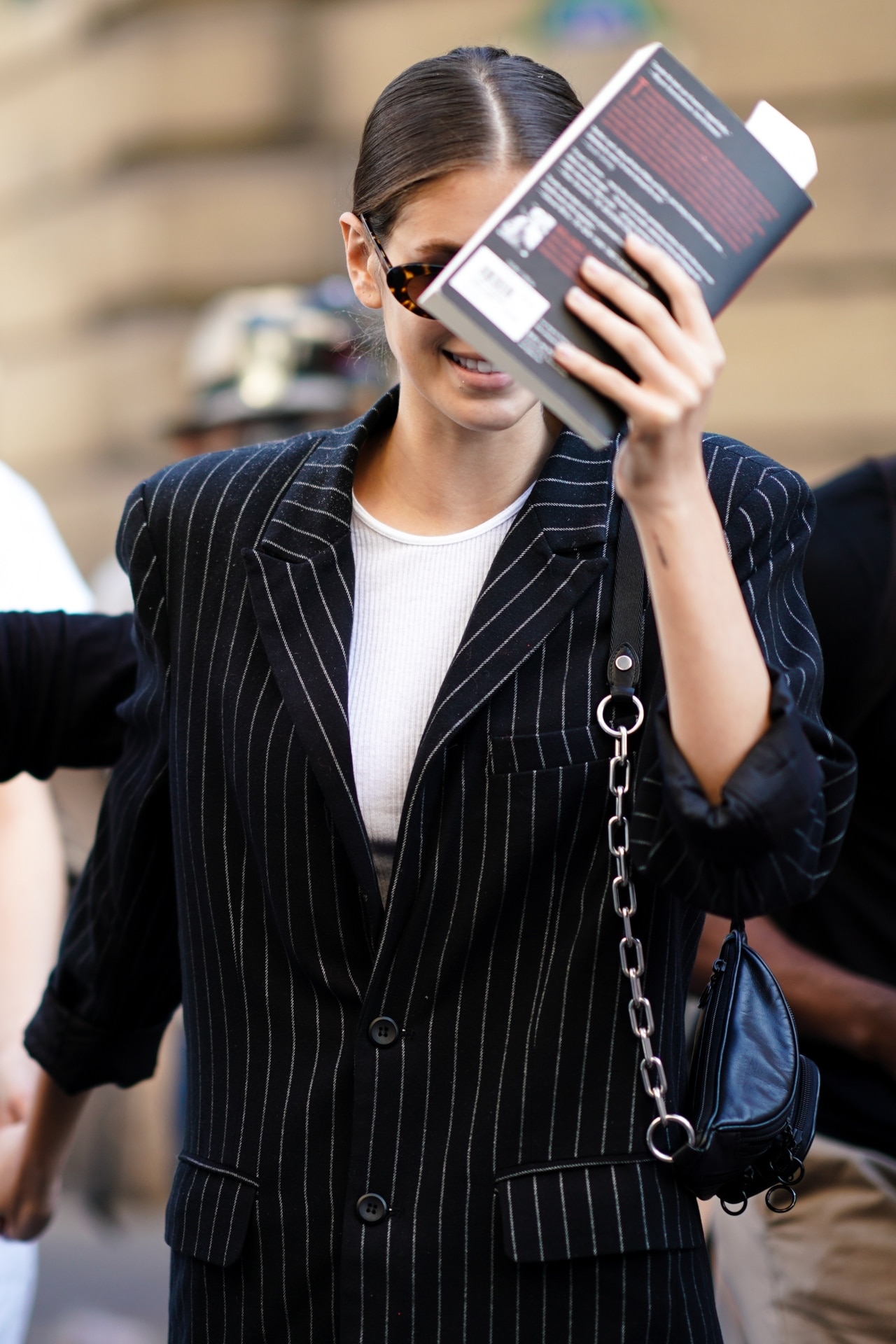 <p><em>Kaia Gerber with a book at fashion week. Image credit: Getty Images</em></p><p>Meanwhile Chanel has the <a href="https://www.chanel.com/fr/mode/evenement/rendez-vous-litteraires/" target="_blank" rel="noopener">dream book club</a> in its Rendez Vous-Litteraires concept, which highlights the work of women. Then there’s the<a href="https://www.vogue.com.au/culture/features/how-hot-girl-books-became-the-ultimate-fashion-accessory/news-story/6b4fa242936a500eb6520e486e7025af" target="_blank" rel="noopener"> ‘hot girl books,’</a> beloved by the likes of Kaia Gerber and Kendall Jenner (and also everyone, it is a mindset after-all). </p><p>Fashion and literature fits the way clothes have infiltrated all corners of culture. Each benefits the other—be it the gloss of fashion, the elevation of fashion to highbrow status or the way it offers a way to examine how someone is presenting themselves to the world.</p><p>Fashion is, after-all, an ultimate tell. </p><p><a href="https://www.newsletters.news.com.au/vogue"><i>Sign up to the Vogue newsletter</i></a></p>