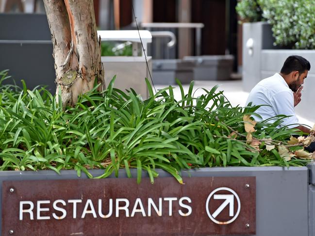 Smoker outside the restaurants in Hornsby Mall. Picture: Troy Snook