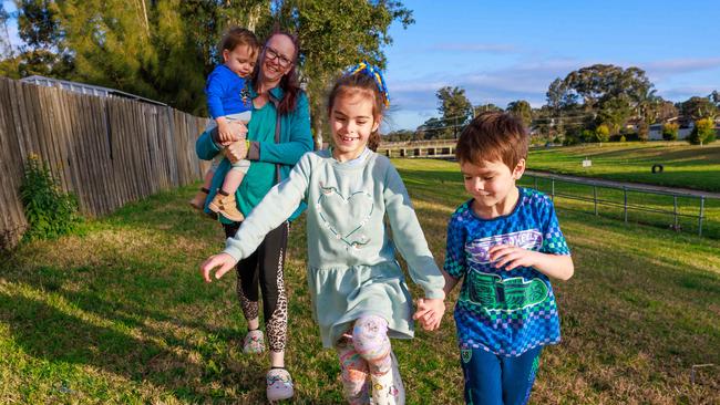 Kate Sohl and her kids are among the many financially disadvantaged families hit even harder by the cost of living crisis. The school canteen is a once-a-fortnight treat. Picture: Justin Lloyd