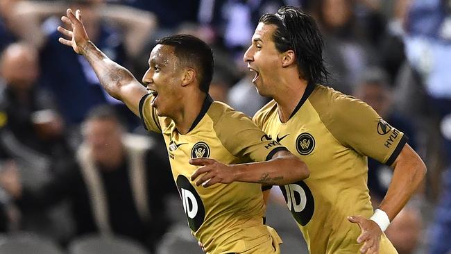 Wanderers midfielder Keanu Baccus, left, celebrates after scoring against Melbourne Victory at Marvel Stadium. Picture: Getty Images