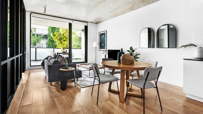 The Waterloo apartment has wide-board timber floors.