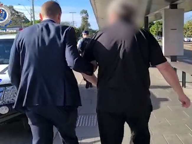 Cameras have captured the moment a middle-aged man was arrested following a police sting to catch online predators. Image: NSW Police